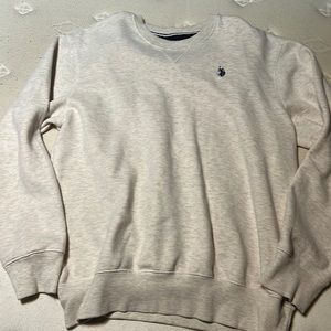 I’m selling this nice sweater and it’s a size Large